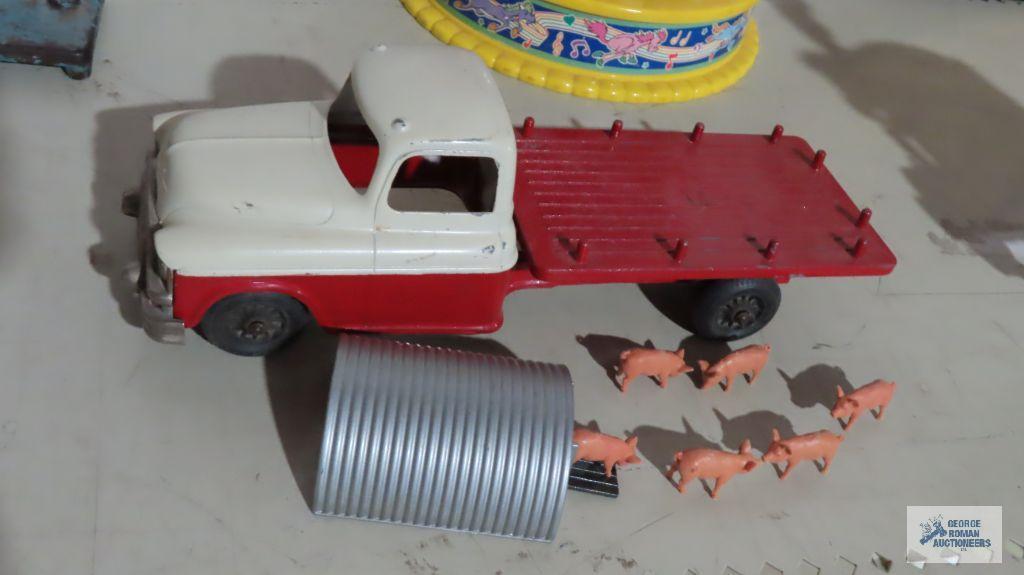 Vintage Hubley Kiddie Toy truck number 494...and miniature pig figurines