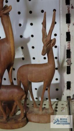 Three vintage hand carved solid wood antelope figurines, made in Kenya