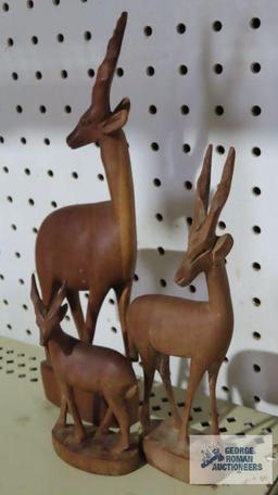 Three vintage hand carved solid wood antelope figurines, made in Kenya