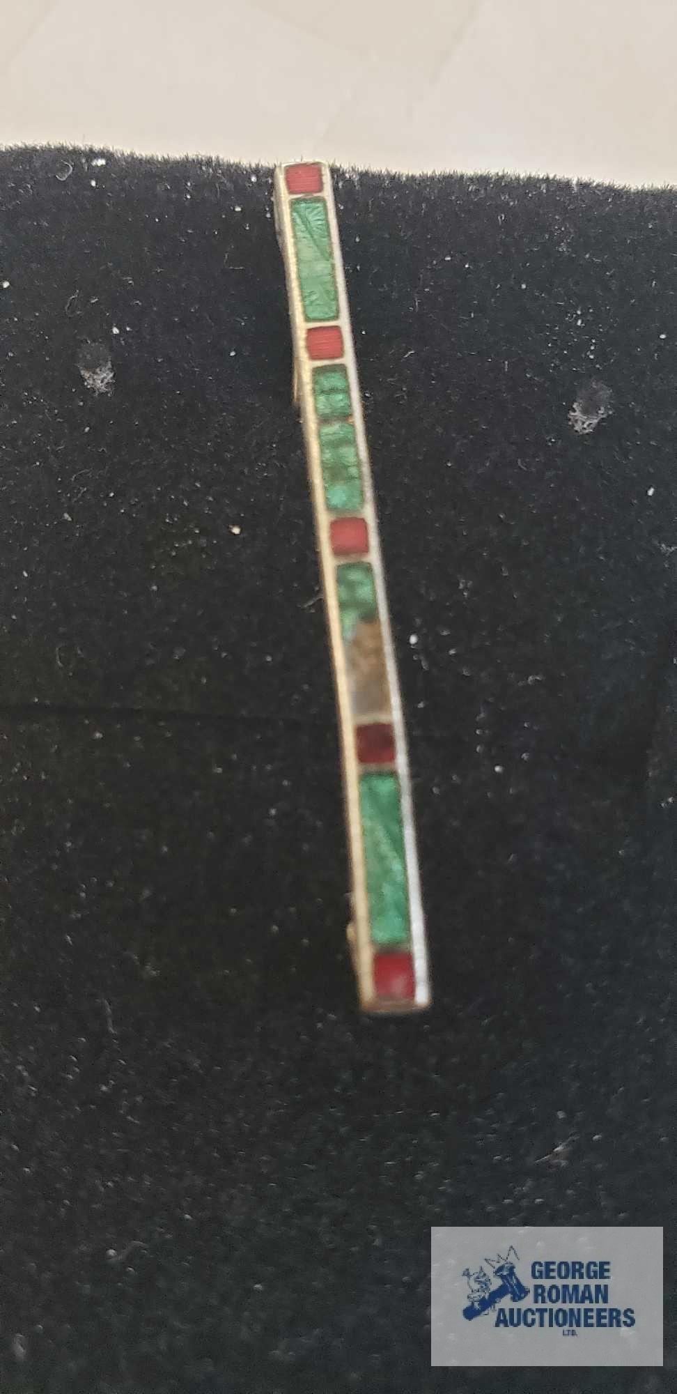 Stick pin with red gemstone, marked 10K and other pin
