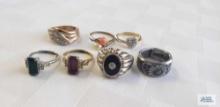 Seven costume jewelry rings