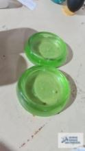 Two 1930s green uranium glass Hazel Atlas floor casters