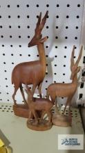 Three vintage hand carved solid wood antelope figurines, made in Kenya