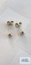 Pair of silver stud earrings, marked 925