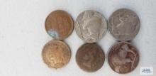 Three buffalo nickels, two indian head pennies, and one wheat penny