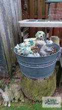 Metal wash tub with yard figurines. Must take contents