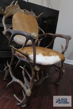 Antler chair with animal hide seat