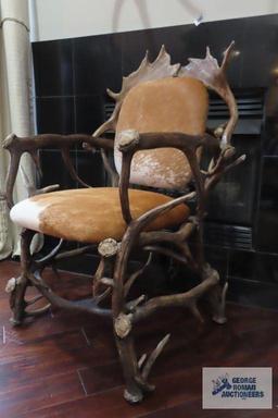 Antler chair with animal hide seat