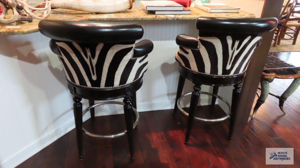 Pair of Maitland zebra...back and leather seat swivel bar stools