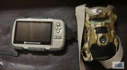 Trail camera by Wild Game and Stealth cam