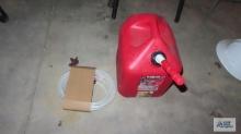Plastic gas can with hose