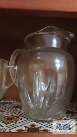 Glass pitcher, mugs, and salt and pepper shakers