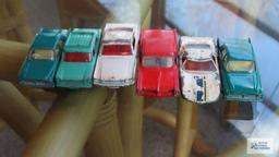 Six cars made in England by Lesney, some missing pieces