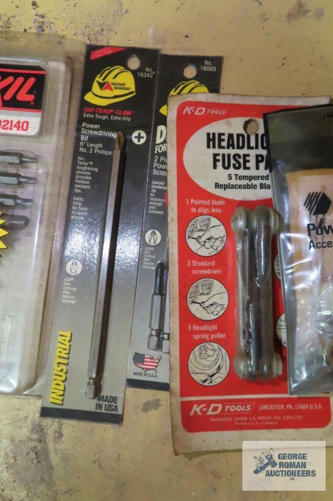 lot of bits, headlight fuse pack tool, etc