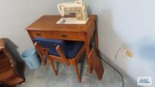 Singer sewing machine with cabinet