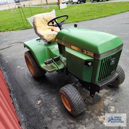 John Deere 332 diesel riding mower. 03630 hours with 52-inch deck and bagger system with blower.