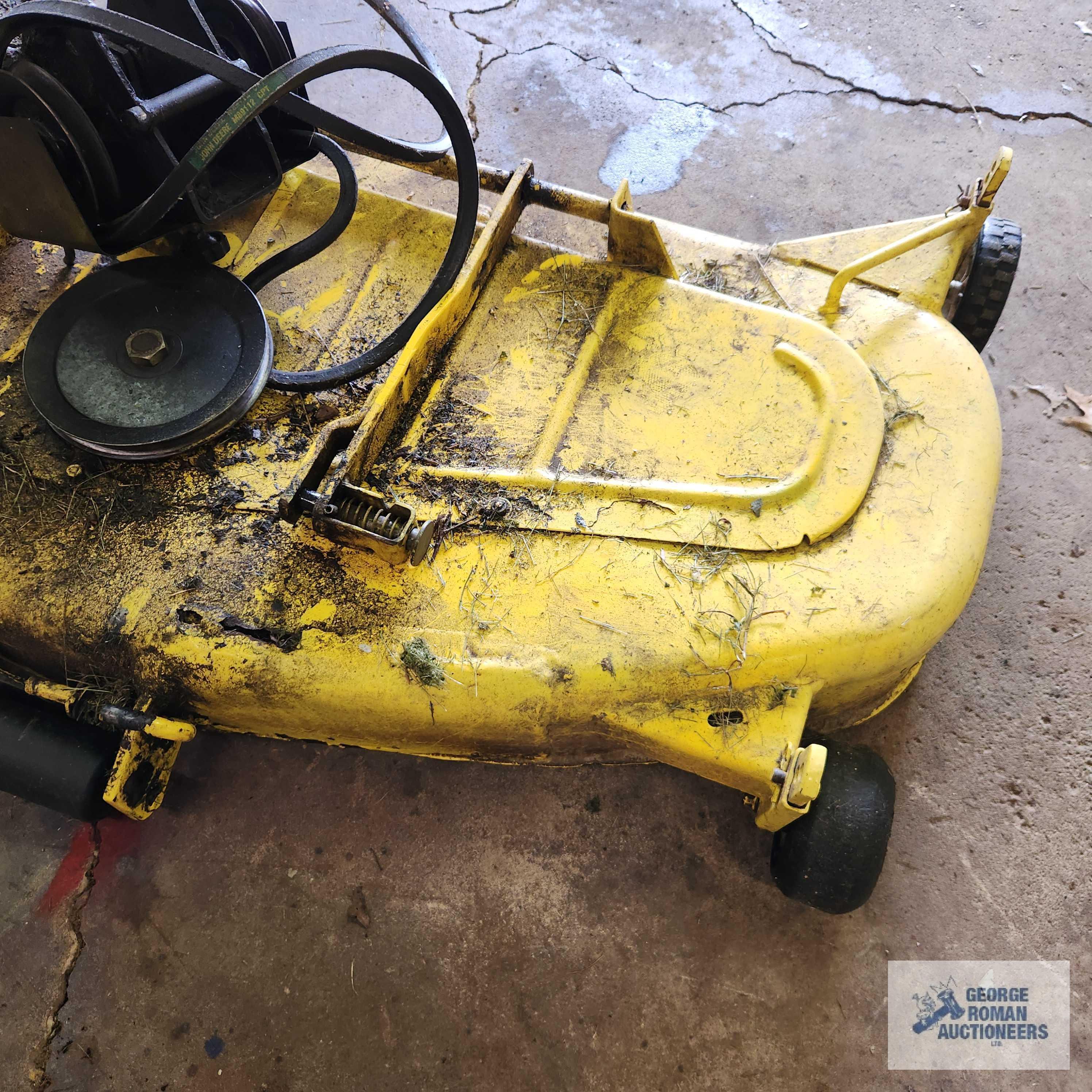 John Deere 332 diesel riding mower. 03630 hours with 52-inch deck and bagger system with blower.