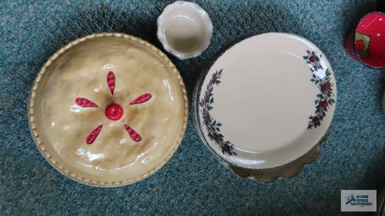 Cherry covered pie plates and decorative platters and bowl