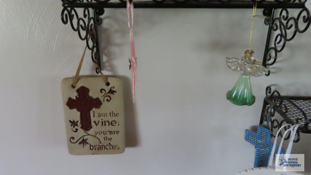 assorted ornaments on metal wall shelves. Shelves NOT included.