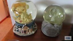 Two musical snow globes