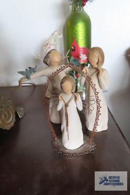 Three Willow Tree figurines