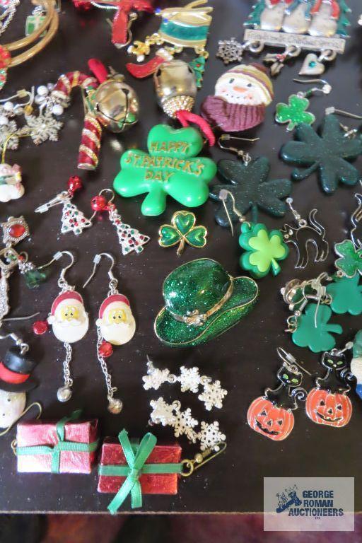 large assortment of holiday jewelry