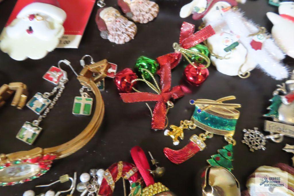 large assortment of holiday jewelry