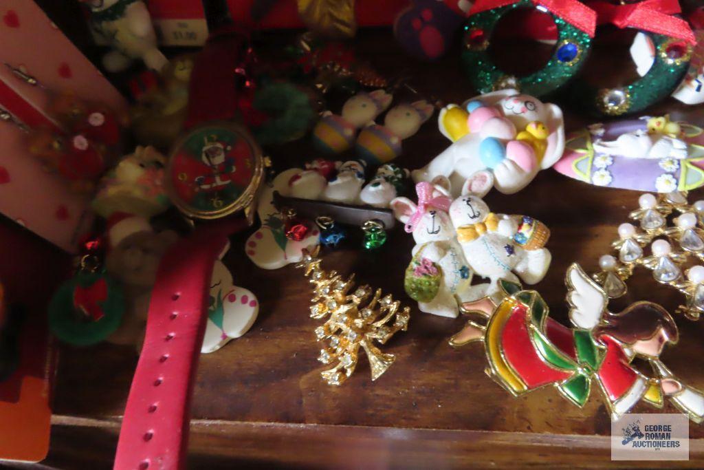 large assortment of holiday jewelry