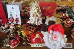 large assortment of holiday jewelry