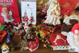 large assortment of holiday jewelry