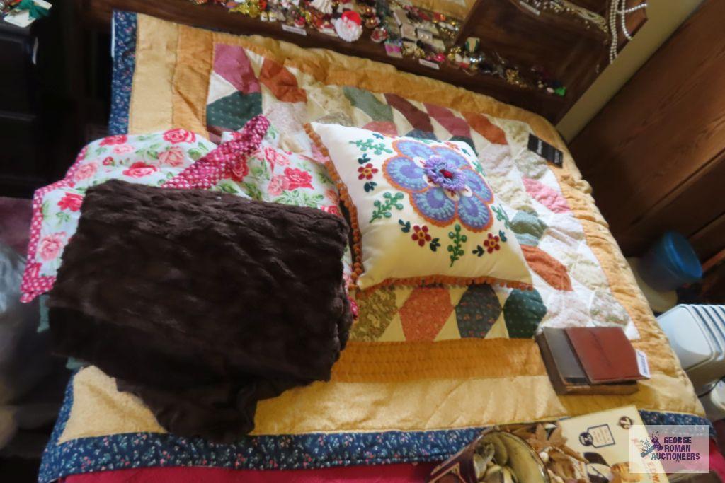 small quilt, pillow and throw blankets