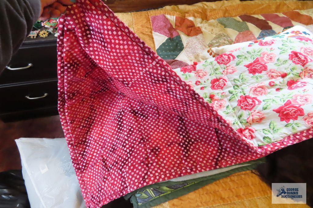 small quilt, pillow and throw blankets