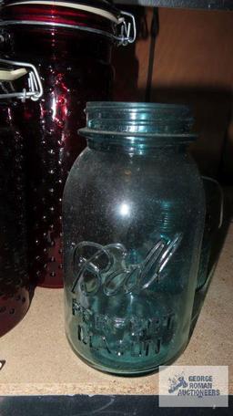 lot of mason jars and canisters