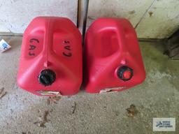Two 5-gallon gas cans