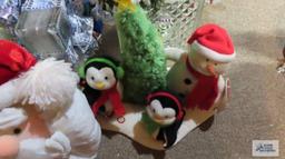 lot of Christmas decorations, animated figurines, etc