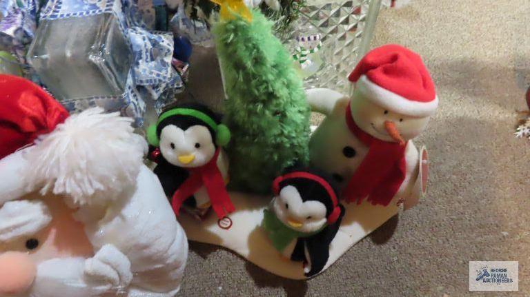 lot of Christmas decorations, animated figurines, etc