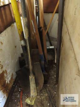 Lot of yard and garden tools including spud bar, shovels and etc