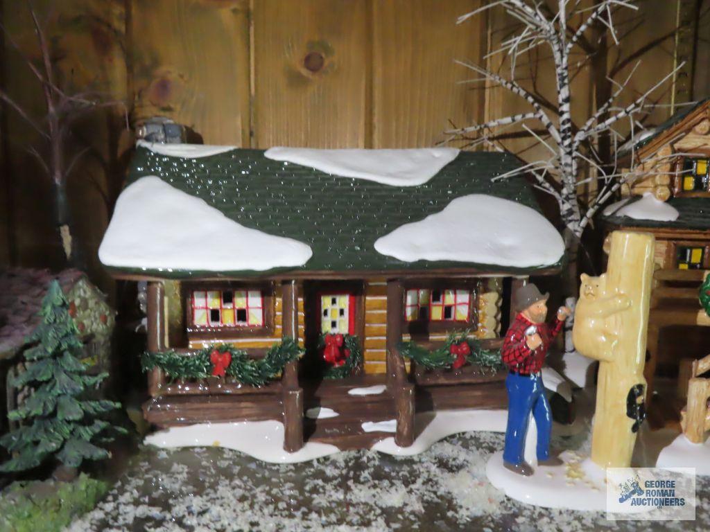 Department 56 log houses with accessory pieces