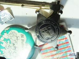 Miscellaneous items, including watches and Saint Patrick's Day pin