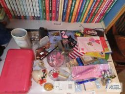 Pencil box, assorted pens, valentine's cards, flashlight, figurines and etc