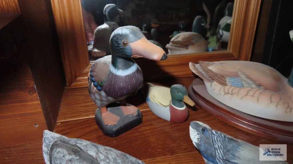 Ceramic, wood, and other decorative duck figurines