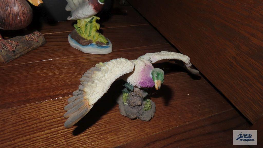 Ceramic, wood, and other decorative duck figurines