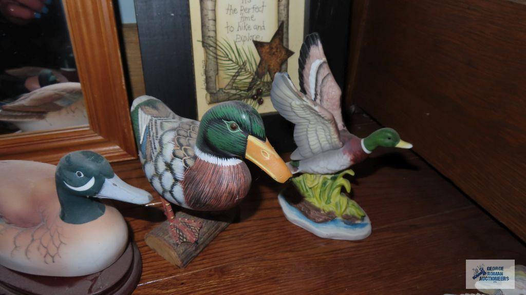 Ceramic, wood, and other decorative duck figurines