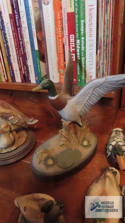 Ceramic, wood, and other decorative duck figurines