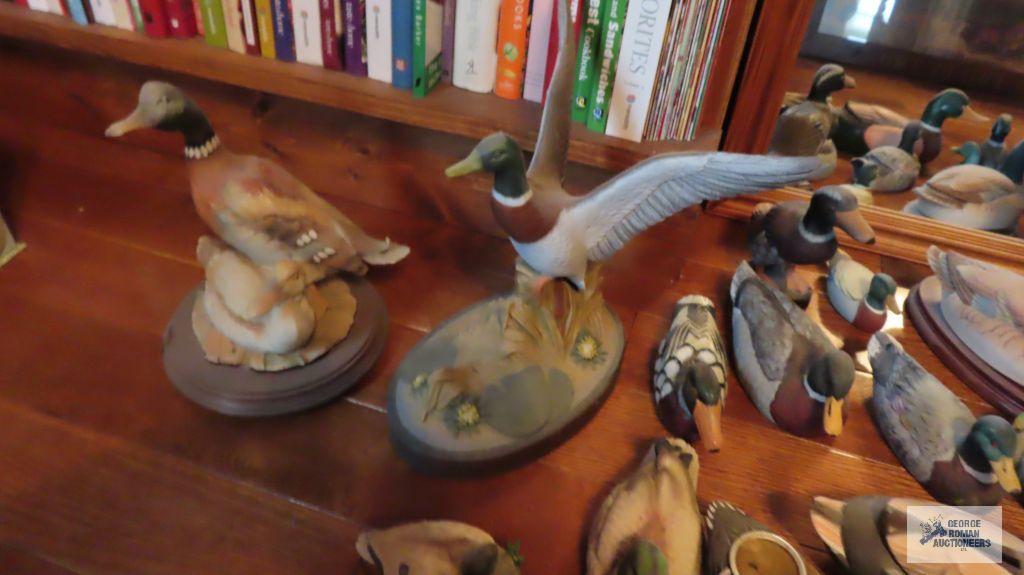 Ceramic, wood, and other decorative duck figurines