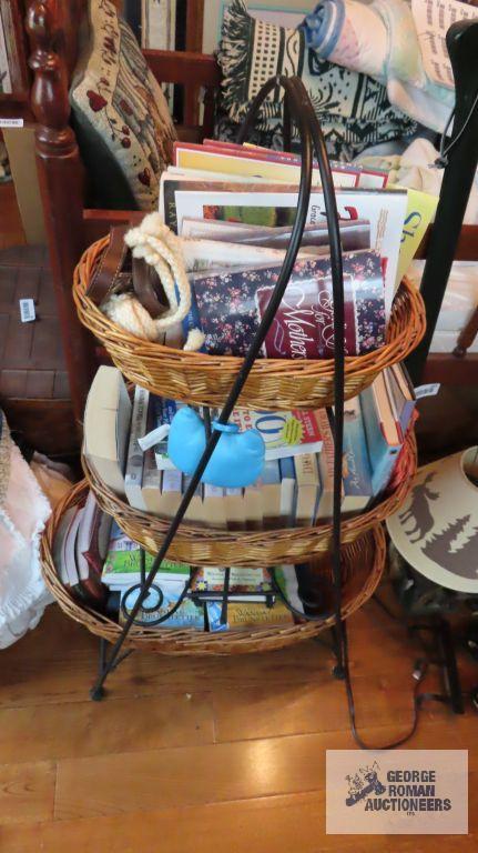 Three tier wire stand with baskets and books