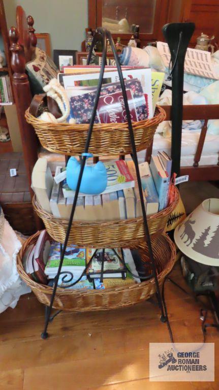 Three tier wire stand with baskets and books