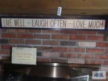 Metal house, candle holders, and love signs