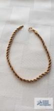 Gold colored rope bracelet, marked 14KT Italy, total weight approximately 1.22 G