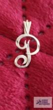 Gold colored "P" pendant, marked 14K, approximate total weight is .58 G